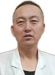Сяо Юнгуй . массажист