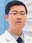 Гань Цзюньда . рефлексотерапевт, невролог
